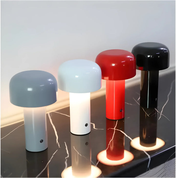 Collection of modern mushroom-shaped table lamps in various colors.