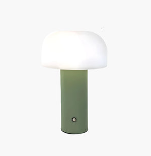 Modern table lamp with a green cylindrical base and white dome-shaped shade.