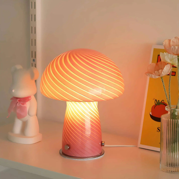 Glowing mushroom-shaped lamp with a swirled pattern on its dome.