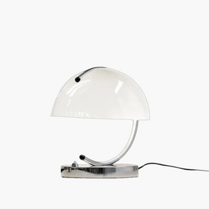 Sleek white desk lamp with a curved metal base and dome-shaped shade.