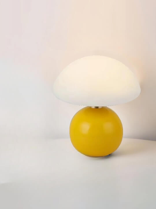 Yellow spherical lamp with a white mushroom-shaped shade.